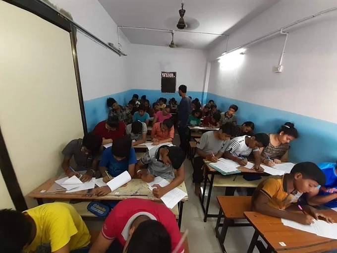 Focused students during a batch session at Ocean Blue Spoken English, Vastral