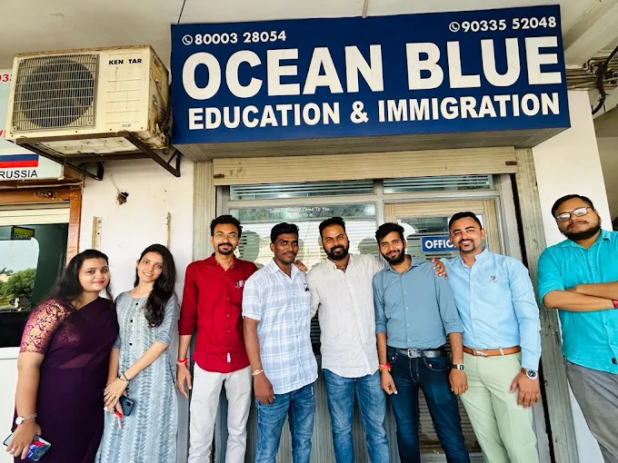 The Ocean Blue Education & Immigration team outside their office