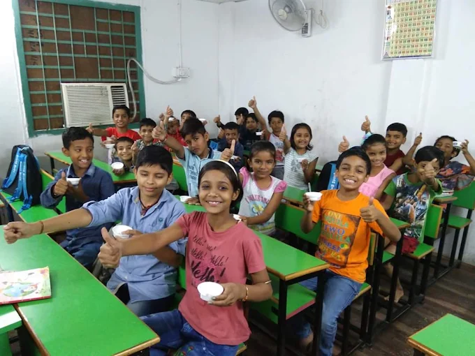 Students celebrating together at Ocean Blue Spoken English, Vastral